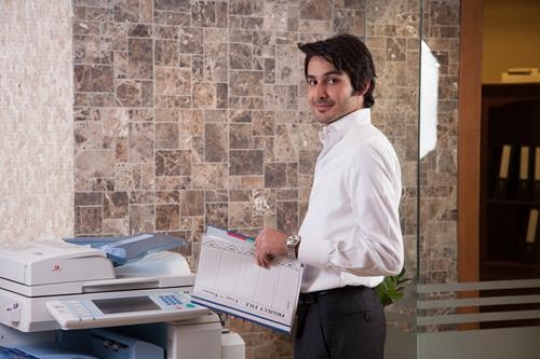businessman working with printer in the office