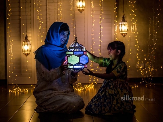 mother and daughter with lantern|-