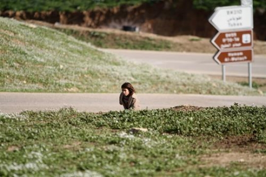 A girl waiting for bus