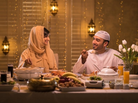 Couple enjoying iftar|-