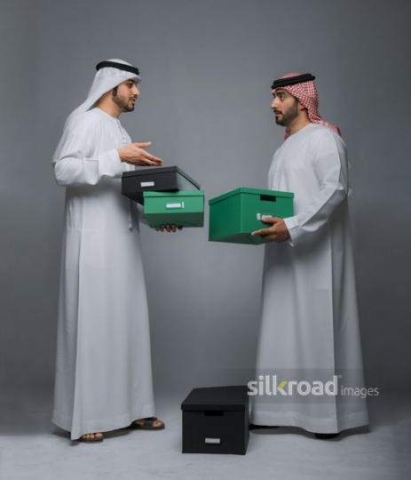 Employees moving boxes