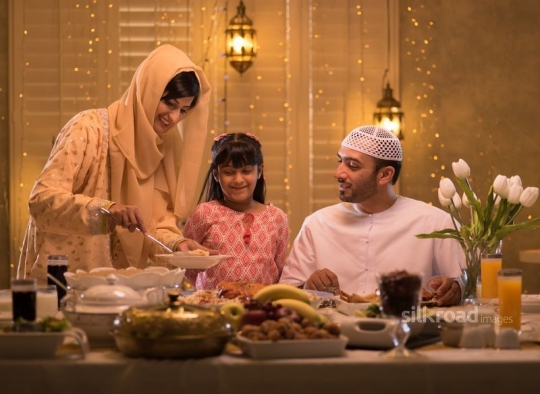 Mother serving food|-