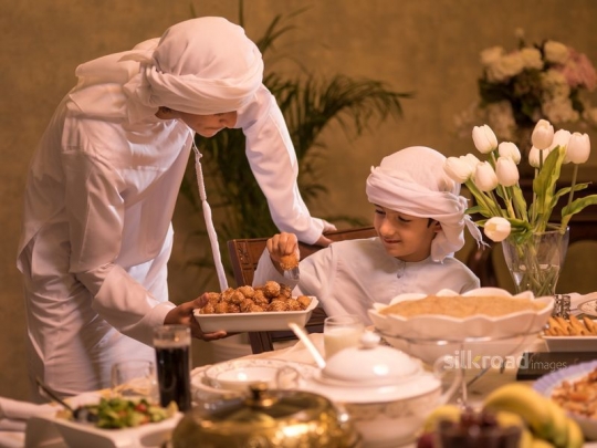 Brother serving kid|-