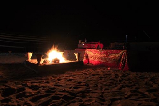 fire in a camp at night