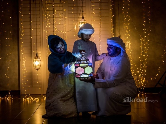 family with ramadan decoration|-