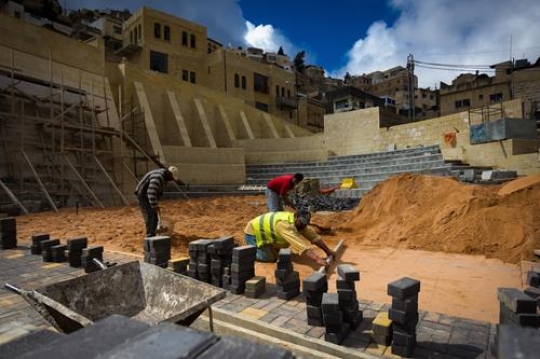 Group of worker working in the town of Salt in Jordan,