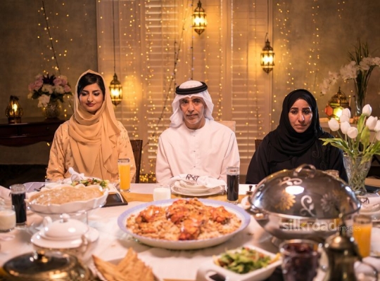 Grandparents with mother around iftar|-