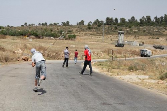 Masked Palestinian boys Resist