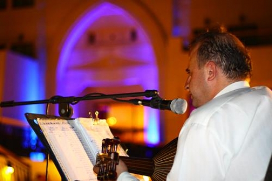 oud player in an evening