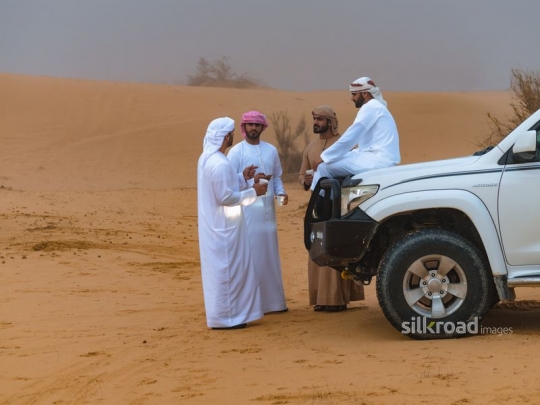 Friends catching up in the desert