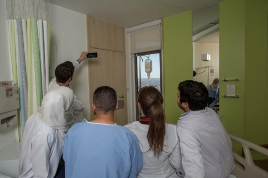 Doctors Taking a Selfie with Patient