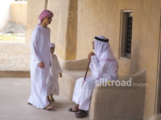 Boys joining grandfather|-