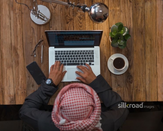 Top view of a workaholic student