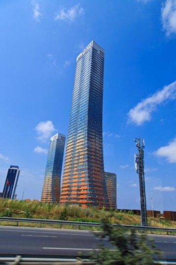 skyscraper on the highway