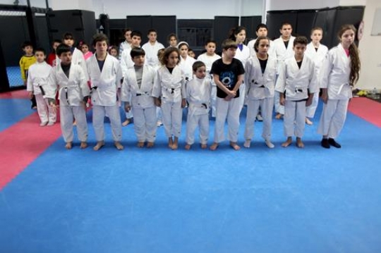 Children in a gym in martial a