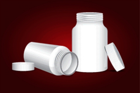 bottle for tablet on red background