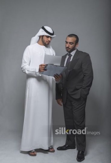 Employees discussing updates