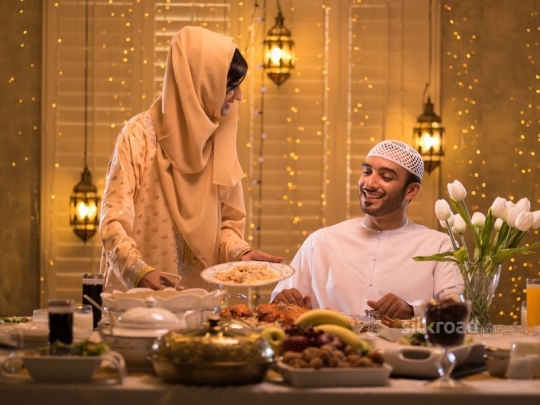 Arab couple having iftar|-