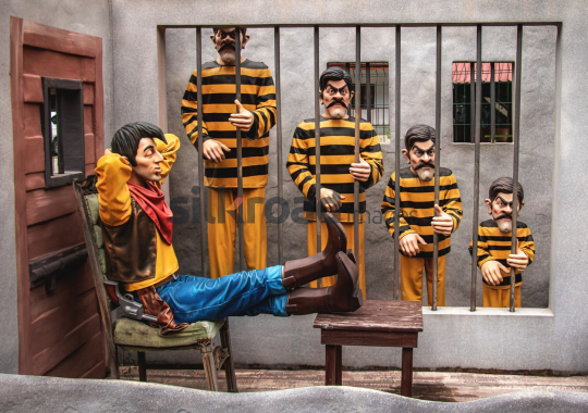 Fun Characters in a Playful Jail Scene at an Amusement Park