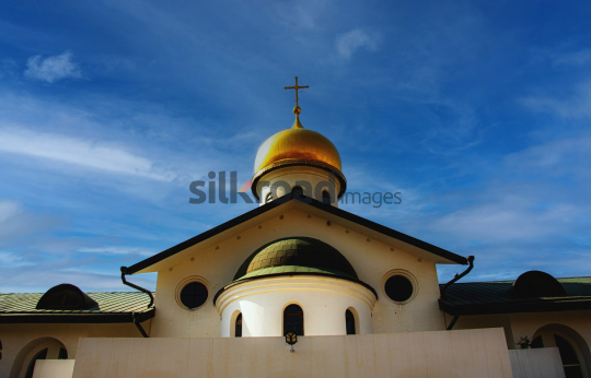 Golden Dome and Cross at Mount Nebo Church in Madaba