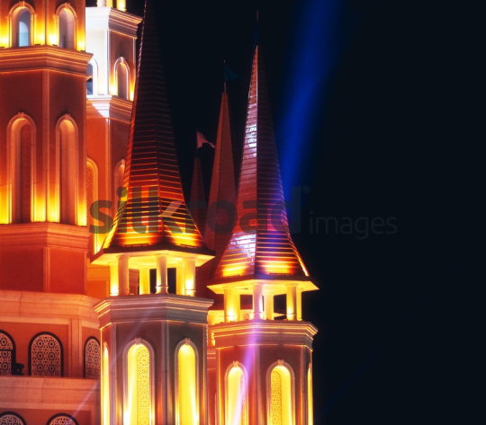 Nighttime View of Illuminated Castle Towers in Antalya