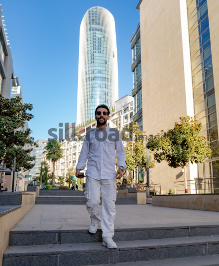 Professional Man Walking Through Al Abdali Boulevard, Amman