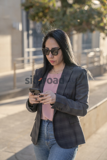 Professional Woman Enjoying Morning Coffee in Al Abdali Boulevard