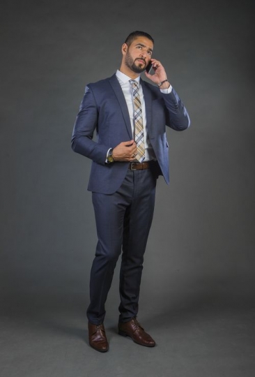 Businessman speaking over the phone|-