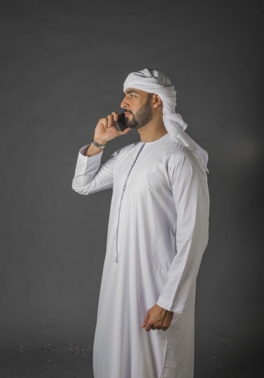 Arab man having a phone call|-