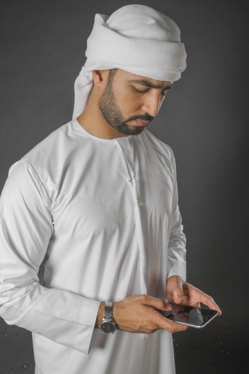 Middle Eastern Businessman texting |-