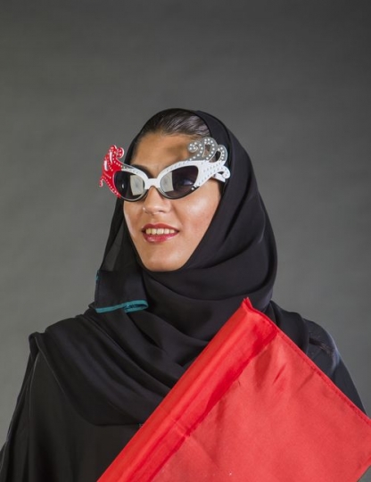Middle Eastern woman having fun celebrating the UAE National Day
