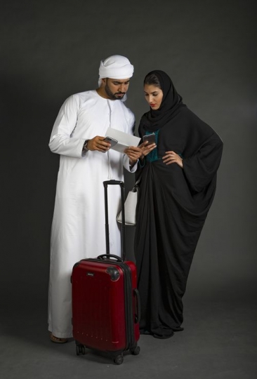 A Middle Eastern Couple Traveling|-