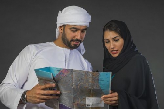 Couple looking at the map together|-