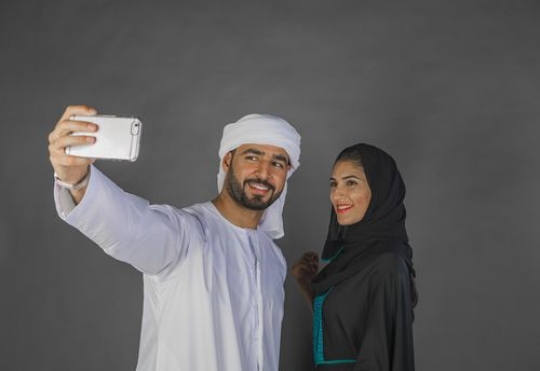 Arab Couple Taking a Selfie|-