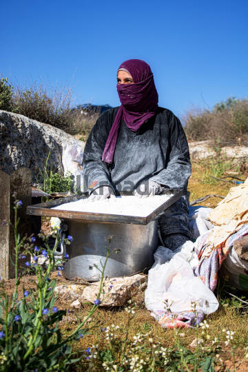 Woman Creating Traditional Bread in Garesa Village