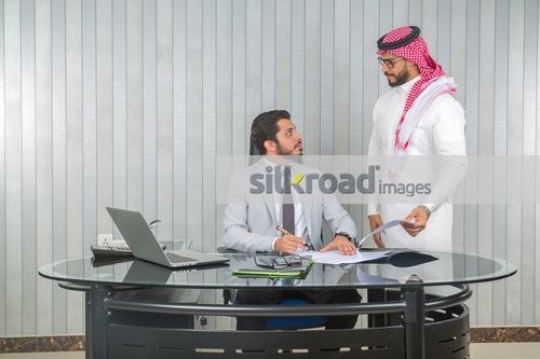 Arab Businessmen at the office working|