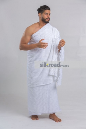 Man dressed in the religious attire|