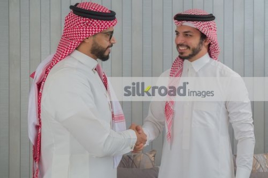 Arabian Businessmen shaking hands|